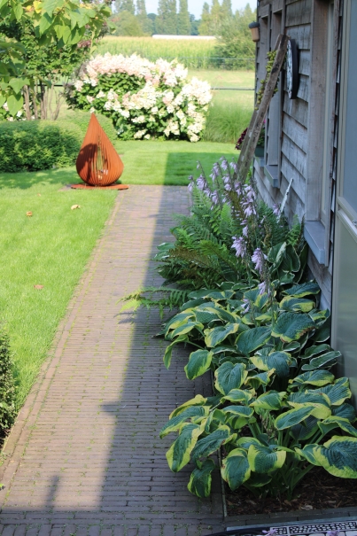 tuin betonklinkers oprit zwembad tuin